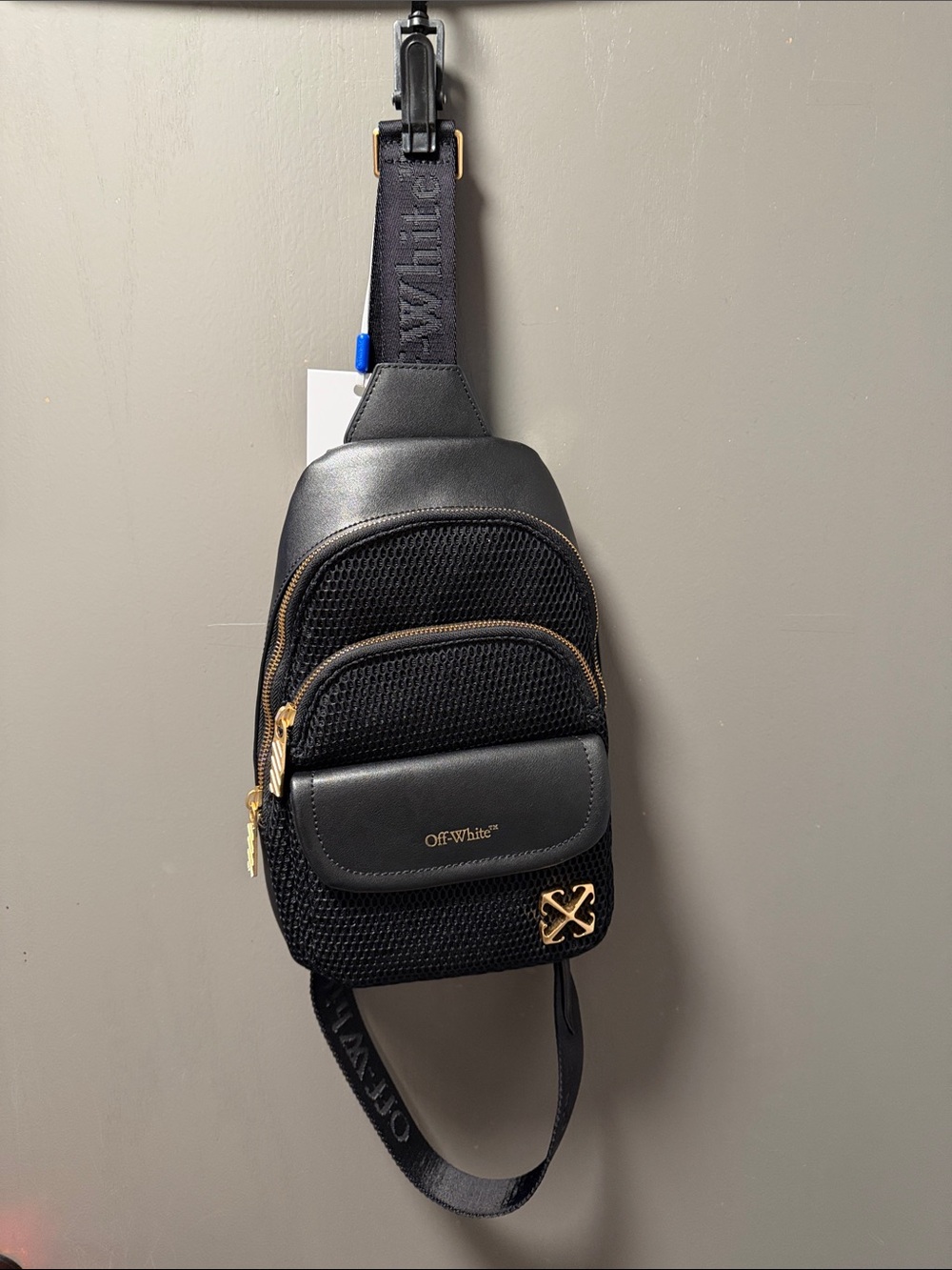 Off-White Black Sling Bag with Gold Accents